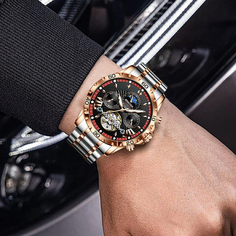 Luxury watch on a person's wrist with a car interior background