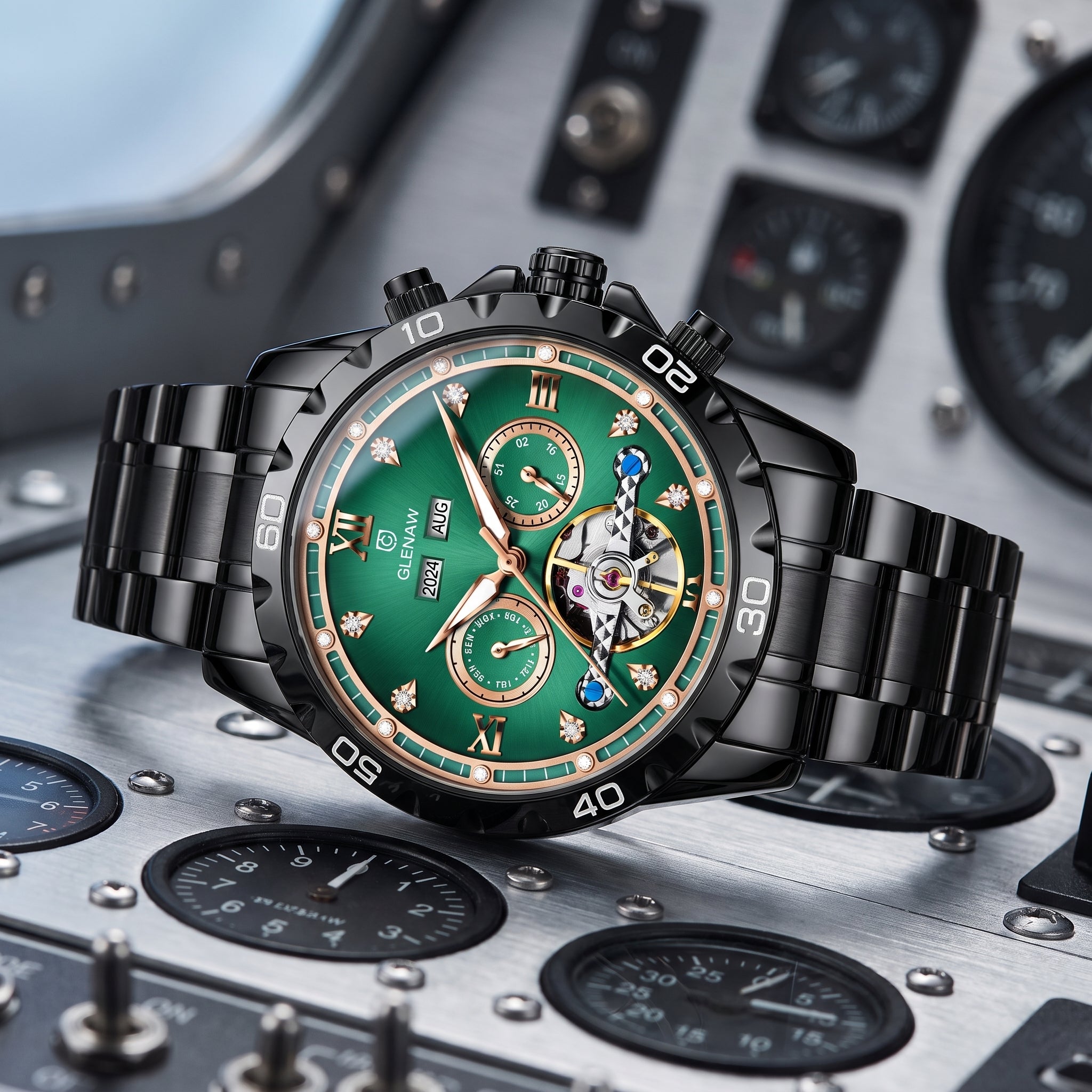 A luxury chronograph wristwatch with a glossy black metal link bracelet, a vibrant green dial, and gold-tone accents, displayed on a metallic instrument panel background.