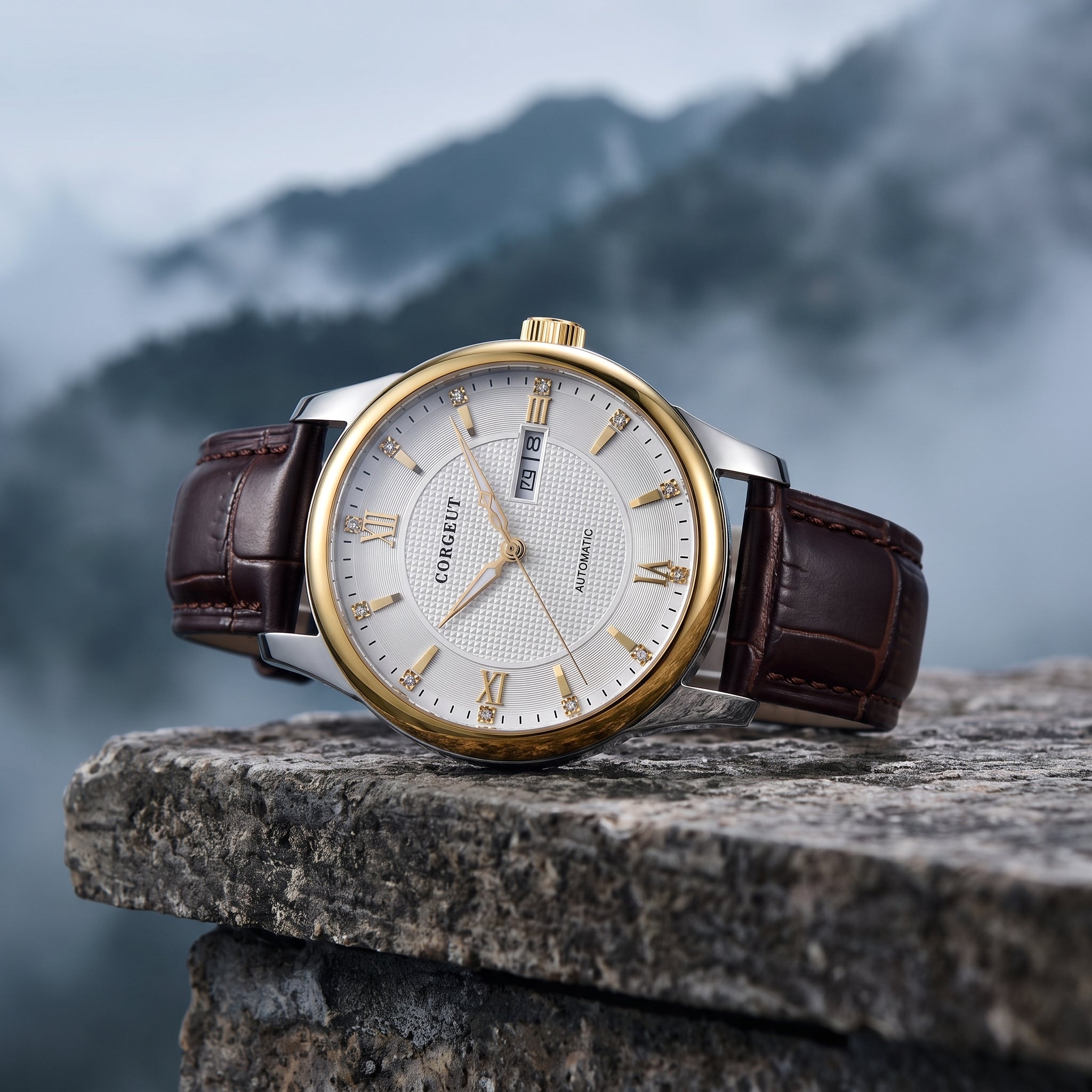 A Conneaut men's watch with a brown leather strap, gold-tone case, and textured white dial, resting on a stone ledge with a misty mountain background.